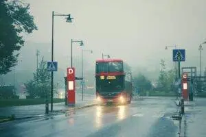 Double-decker bus in fog at Jönköping, Sweden bus stop.