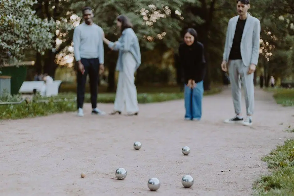 Friends enjoy a lively game of petanque in a scenic park, embracing outdoor fun and togetherness.