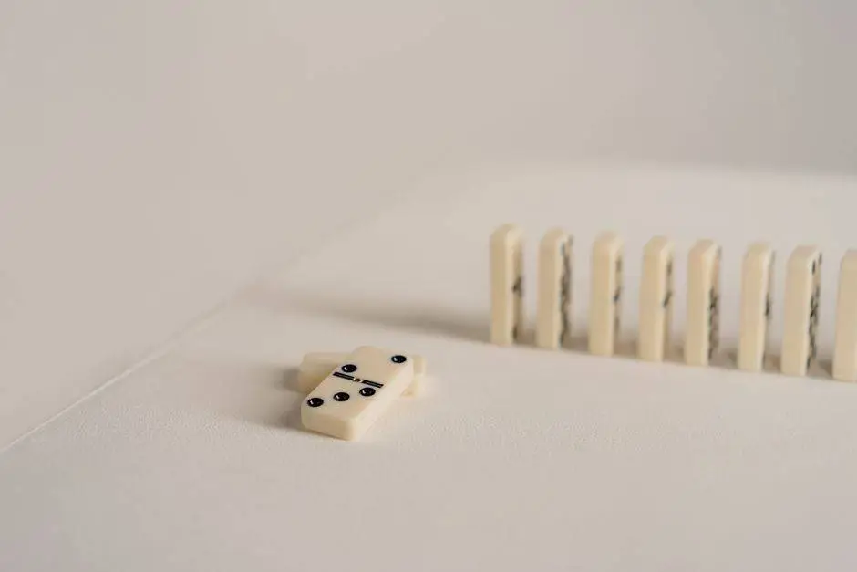 Close-up of domino tiles arranged in a row, highlighting minimalistic game setup.